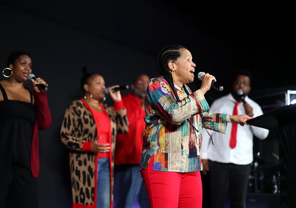 The NDAC worship team singing during a Sunday service