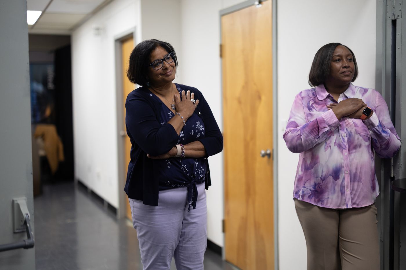 Two church members in the hallway